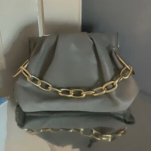 House of Want framed clutch. 

 Grey color with gold hardware